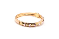 20k Yellow Gold 0.45cttw Diamond and 8.00cttw Oval Purple Sapphire Bangle Bracel