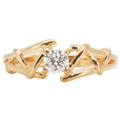 20k Yellow Gold Knot Modern Ring w/ 0.15 total carat Natural Diamonds