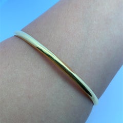 Pulsera brazalete lisa pulida de oro amarillo de 20k