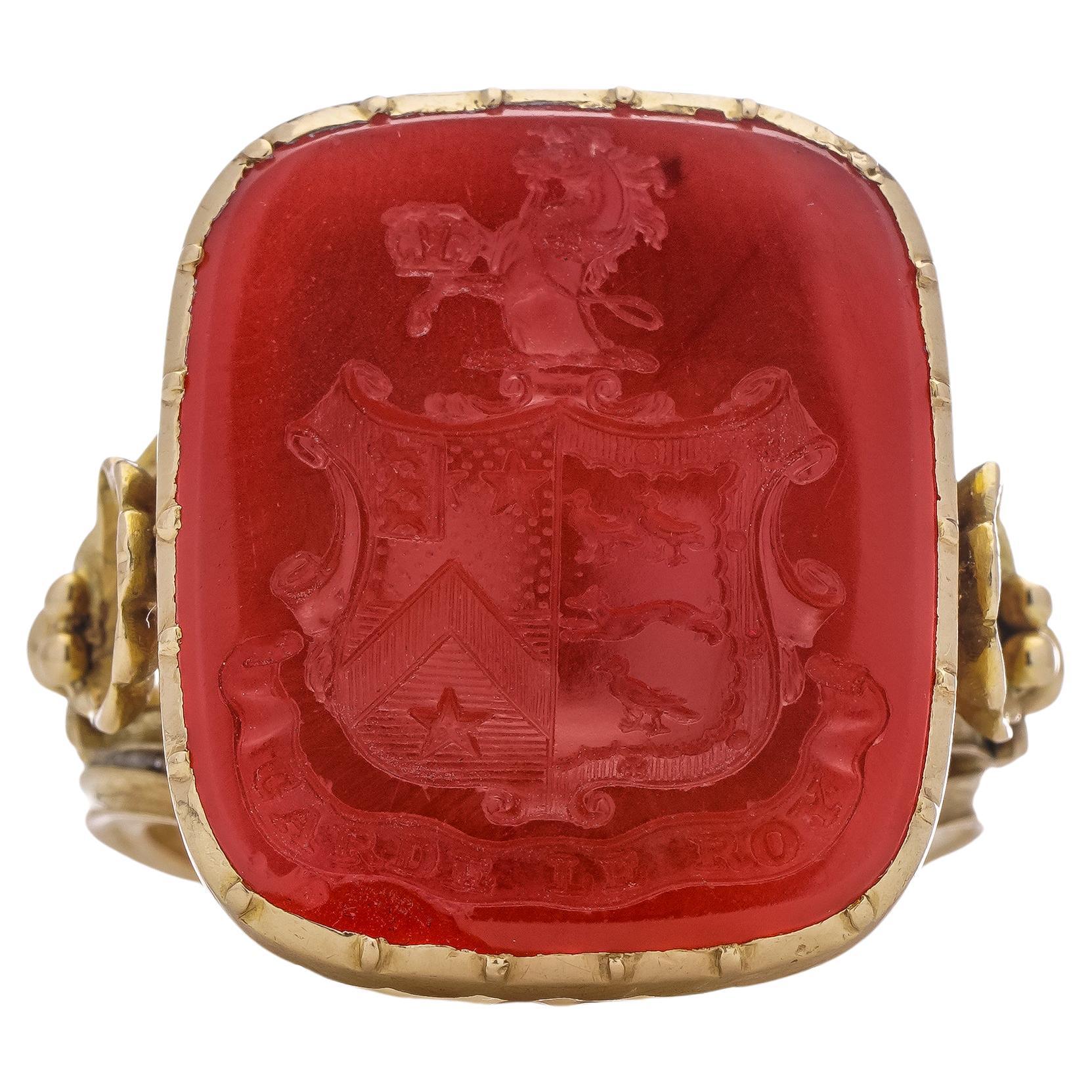 20kt. gold carved carnelian signet ring with coat of arms and Latin phrase