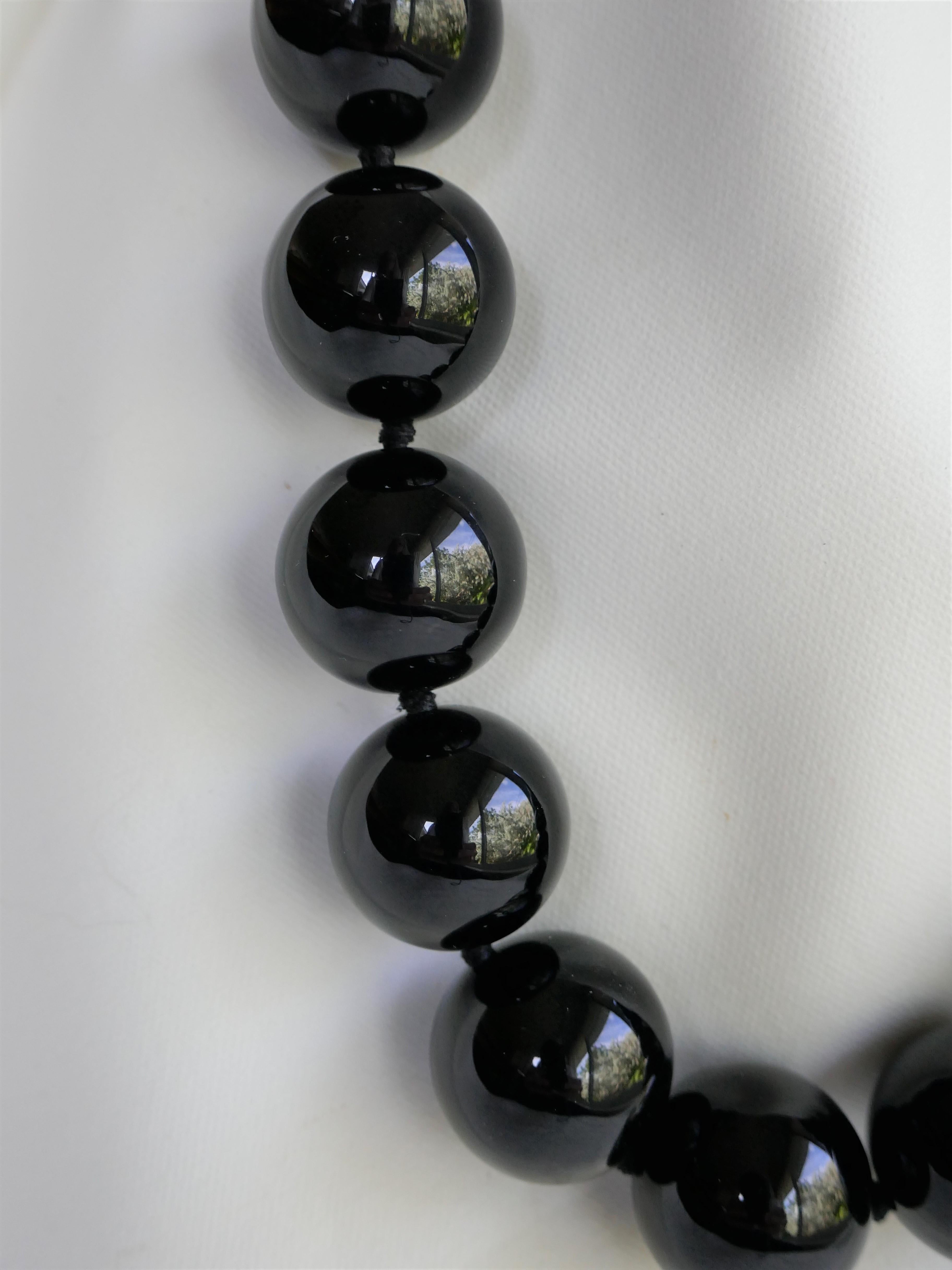 I love 20mm beads or larger. These necklaces are classic modern and make a statement.  When it comes to onyx it basically goes with everything, in the summer with bright color tones and in the winter with the greys, blues, browns... The onyx beads