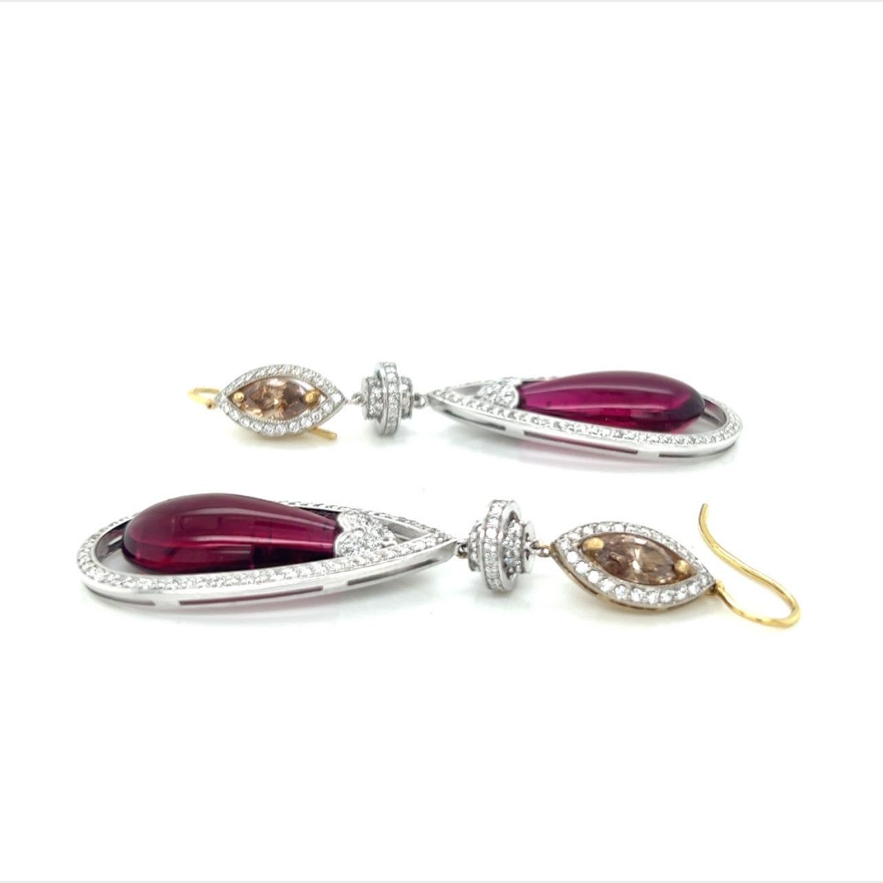Approx. 20cts Drop Rubellite Earrings in 18k White And Yellow Gold with White and Bronze Diamonds.
One of a kind. 