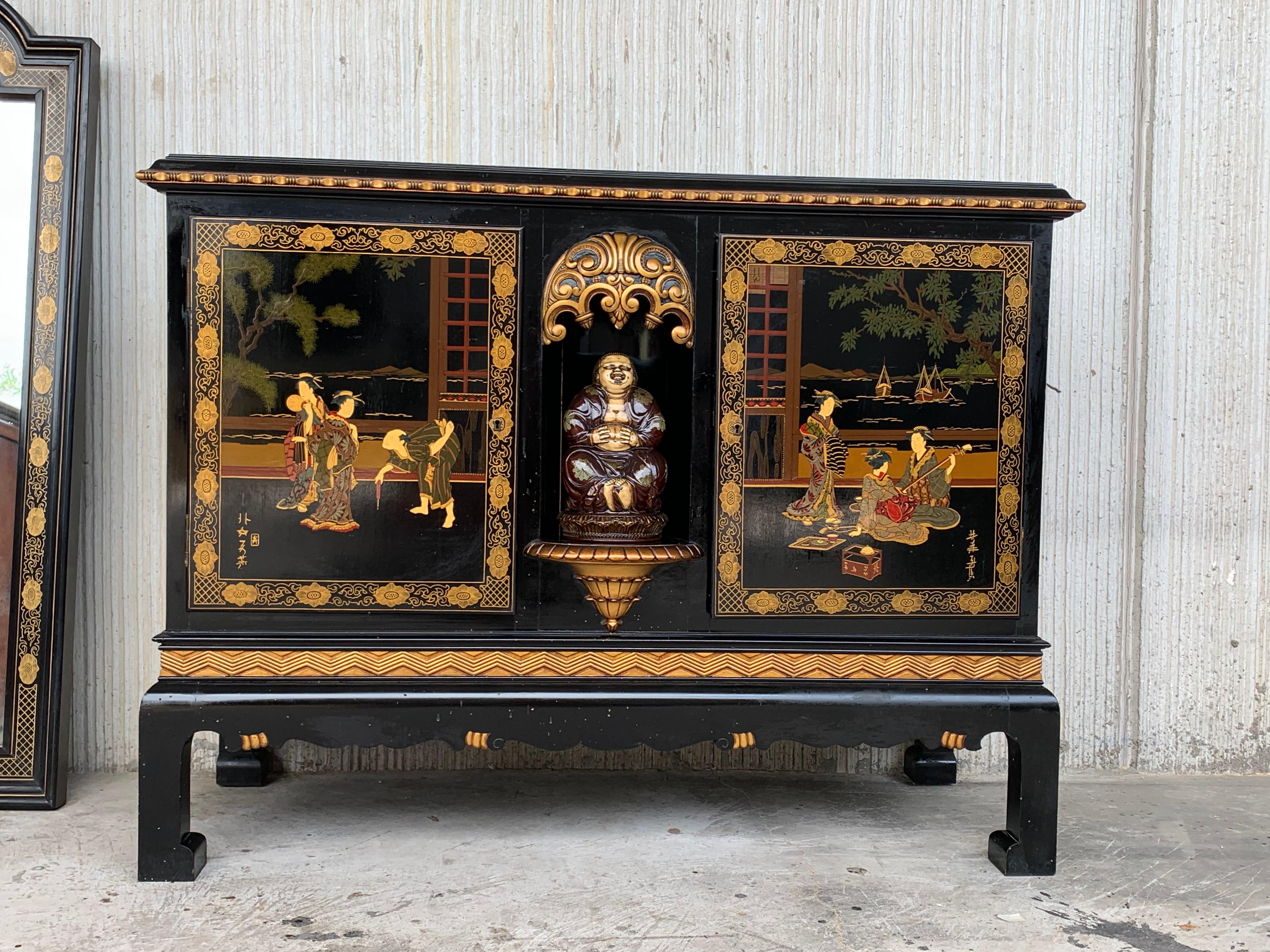 This incomparable chinoiserie black lacquer sideboard depicts figures in various typical traditional scenes. What more can you ask for really? As if that's not enough, there's plenty of traditional hand painted Asian motif from head to toe. The reds