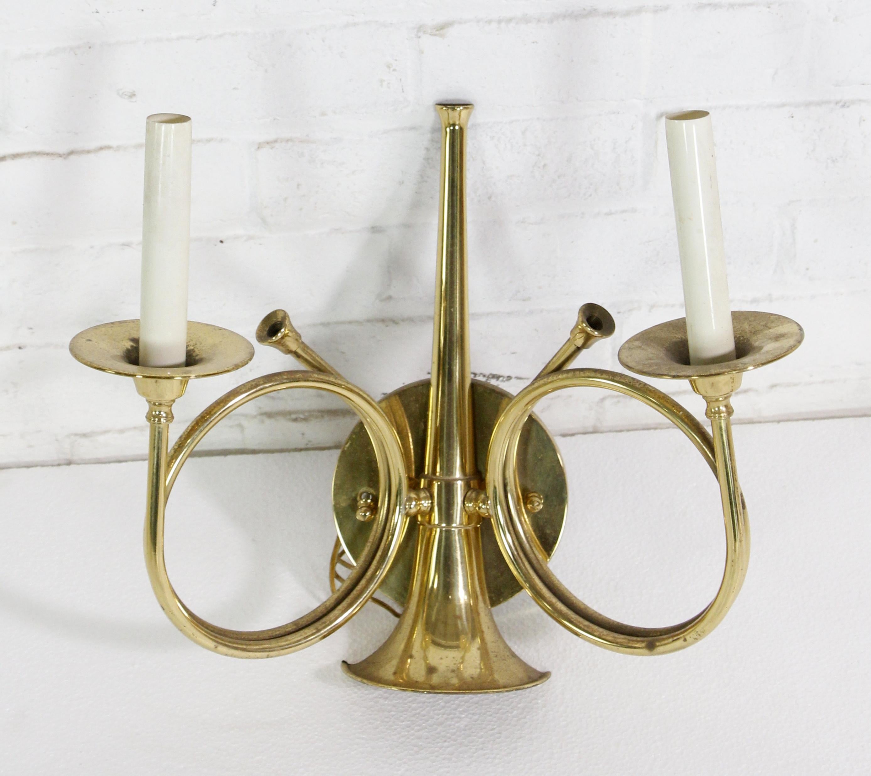 20th Century two arm French trumpet sconce in polished brass. Designed by Frederick Cooper in Chicago. Price includes cleaning and wiring. Small quantity available at time of posting. Priced each. Please inquire. Please note, this item is located in