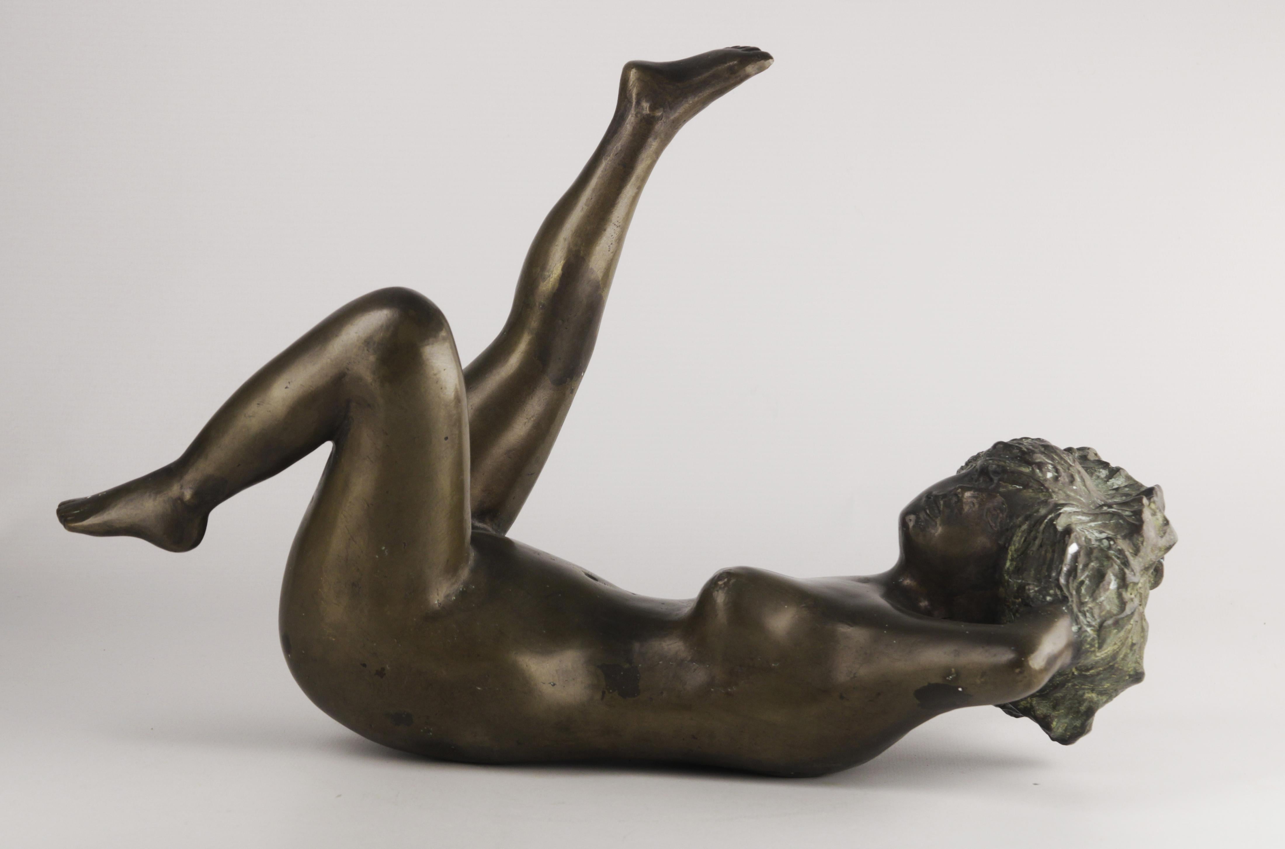 20th century bronze figurative sculpture of a lying woman by argentine sculptor José Mariano Pagés

By: José Mariano Pagés
Material: bronze, copper, metal
Technique: cast, patinated, polished, metalwork, molded, patinated
Dimensions: 16,5 in x 9 in