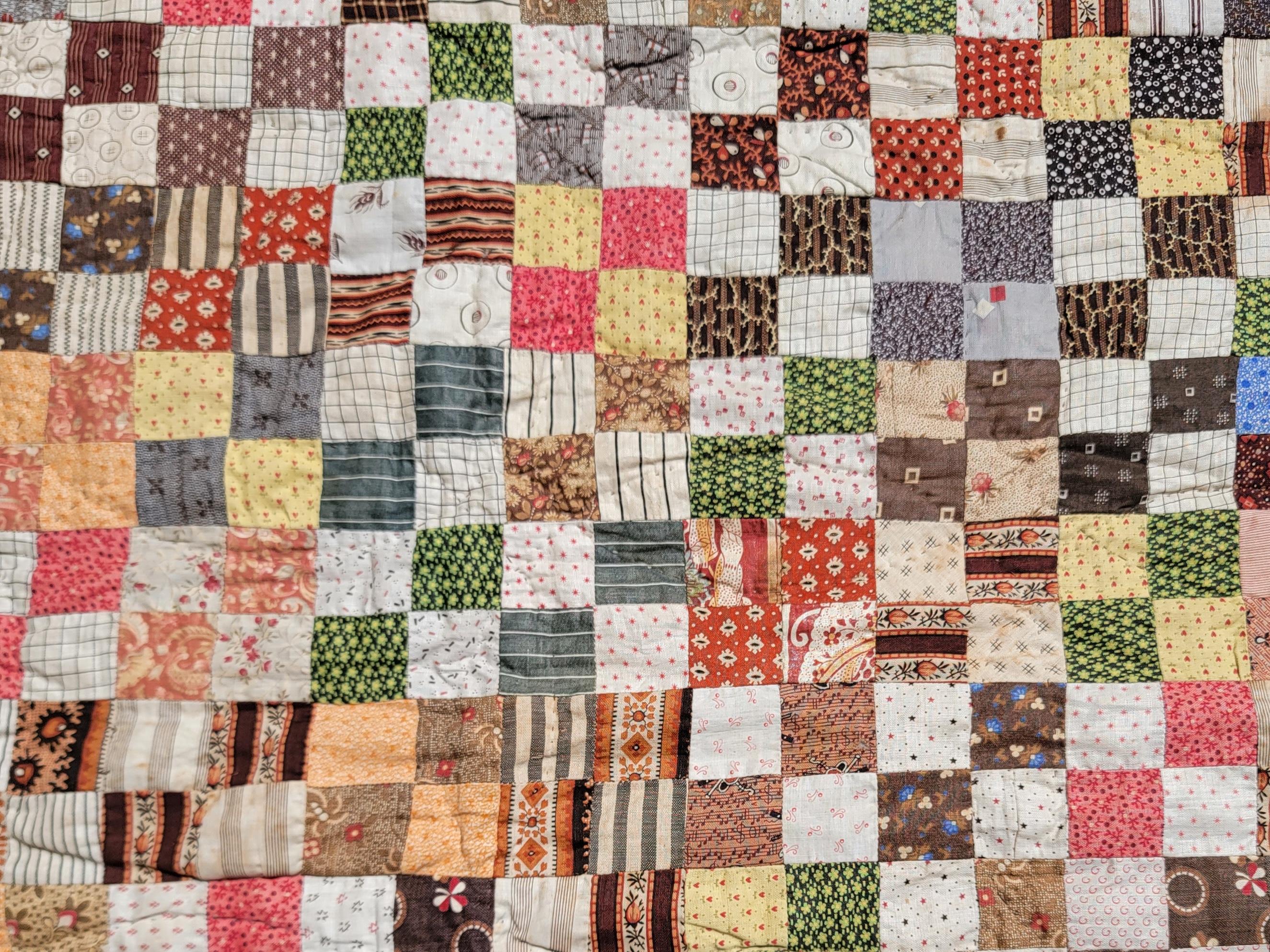 Hand-Crafted 20th C Calico Postage Stamp Quilt For Sale
