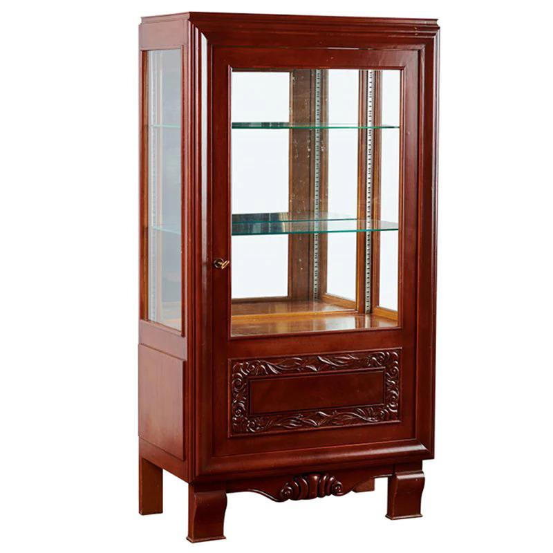 This simplistically carved French Oak Vitrine will suit both contemporary or classical living spaces. Dated 19th C. and made from French Oak, this piece has later been stained with a slight gloss varnish, enhancing the vitrines patina. It has also