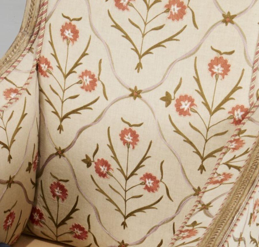 Carved 20th C. Directoire Style Painted and Floral Crewelwork Upholstered Bregere For Sale