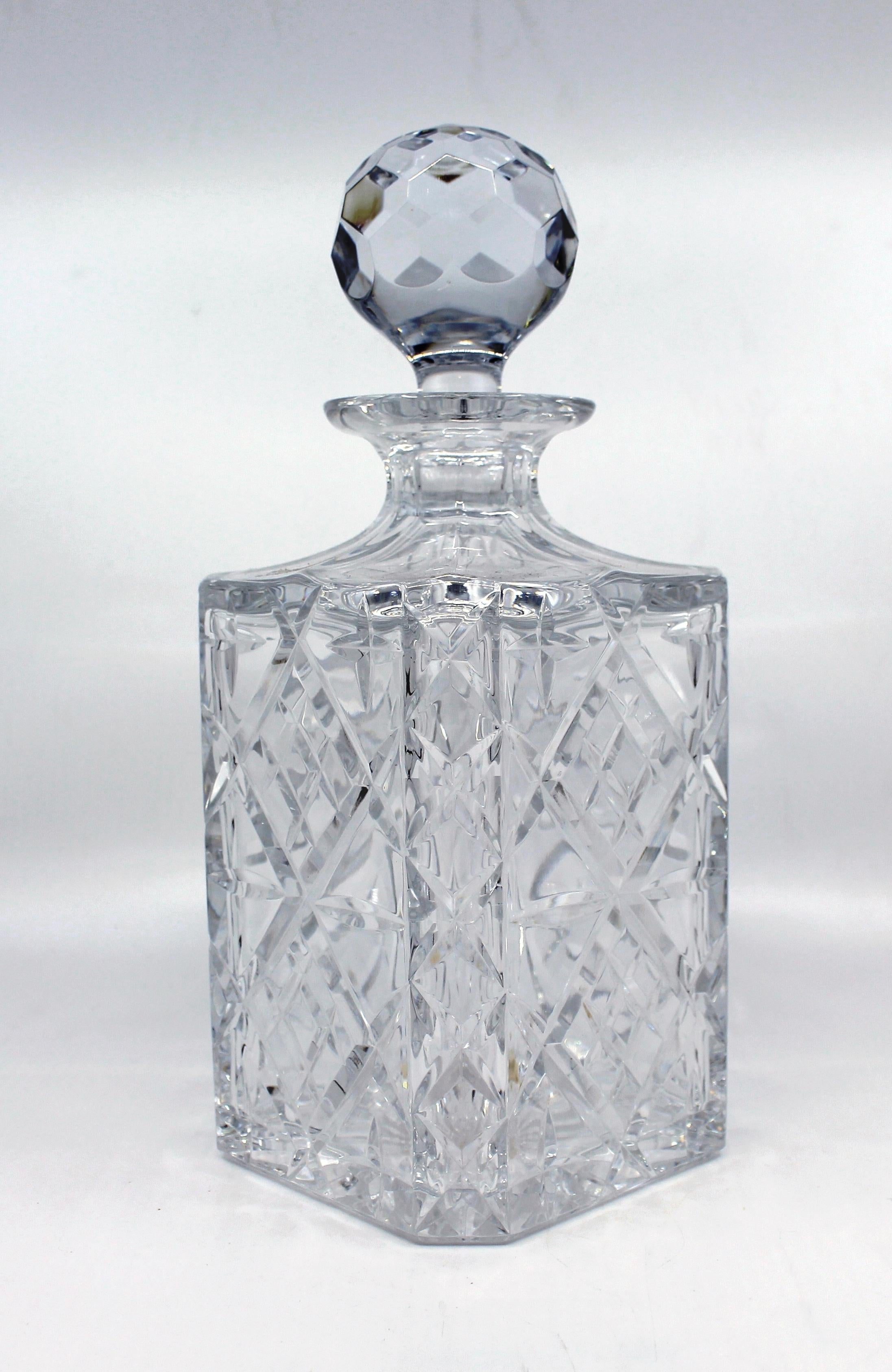 
Origin 
Vintage, 20th century, Stourbridge, England

Measures: Width 
10 cm / 4 in

Height 
24 cm / 9 1/2 in

Glass 
Cut glass

Condition 
Very good condition. Minor light wear commensurate with age
 
 

20th century English cut