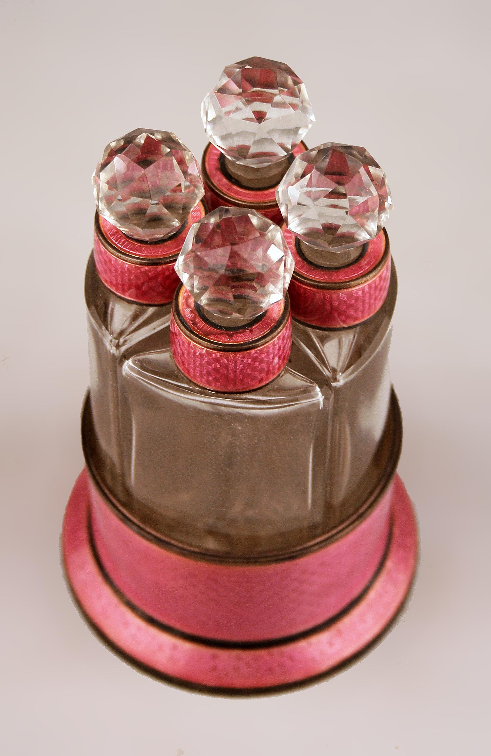 pink and silver perfume bottle