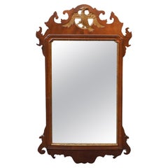A.I.C. 20th C. Phoenix Head Partial Gilt Mahogany Scroll Ear Mirror (miroir d'oreille à volutes partiellement doré en acajou)
