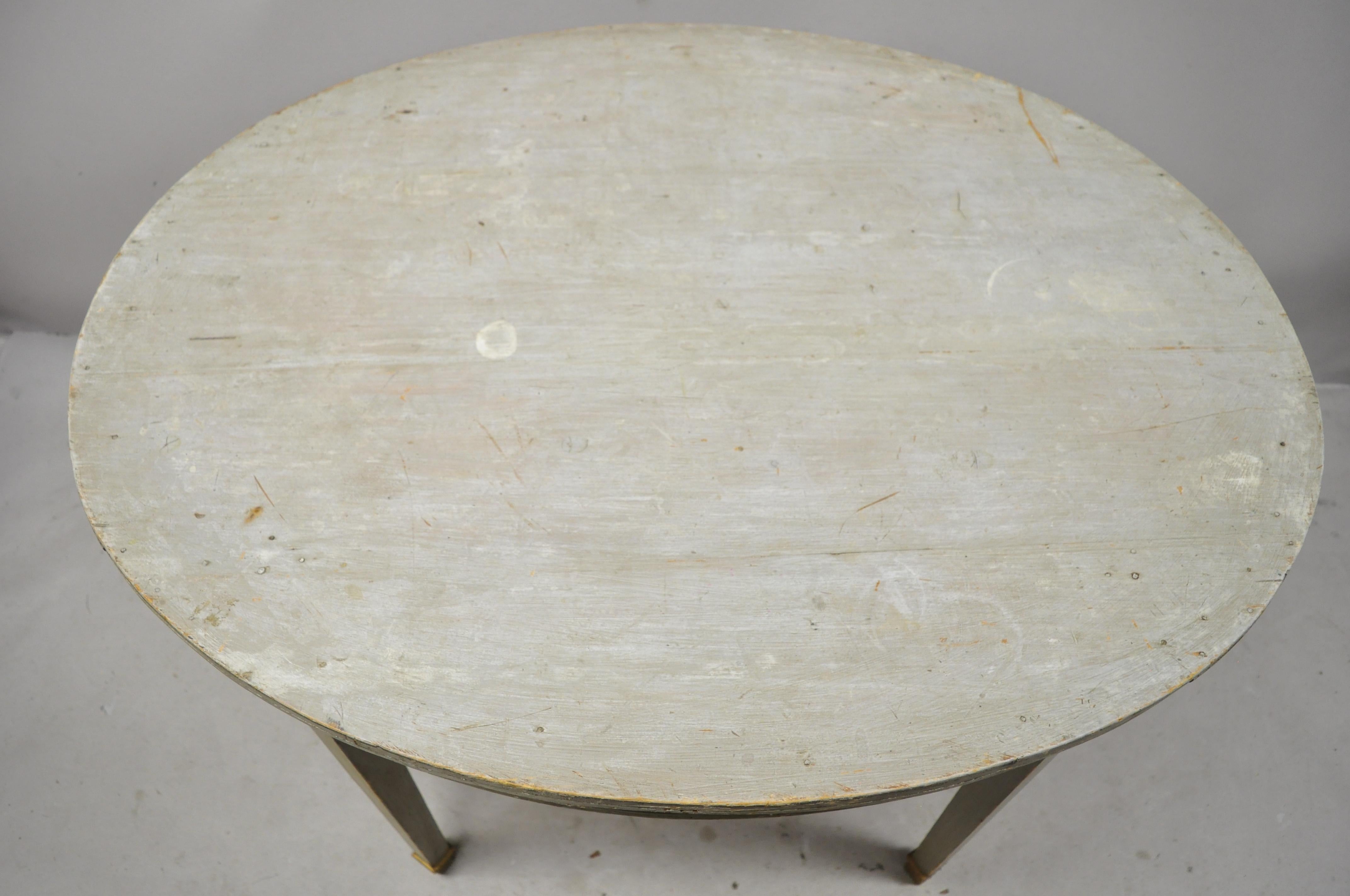 20th Century French Louis XVI Style Distressed Green Painted Small Oval Dining Table