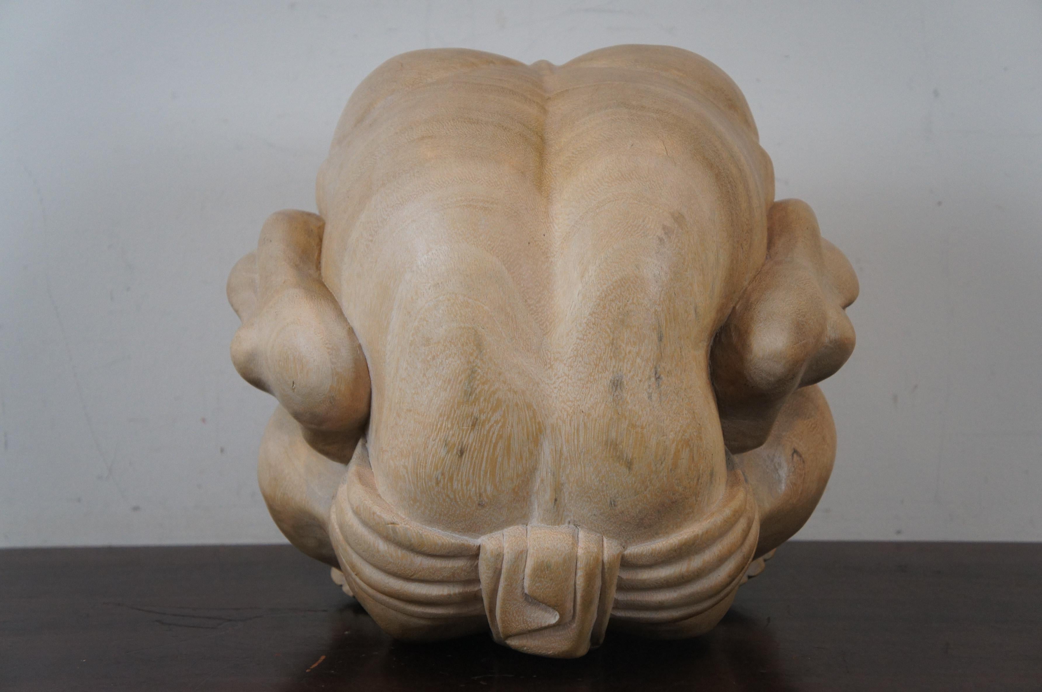 weeping buddha wood sculpture