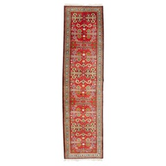 20th Century. Hand Knotted Caucasian Style Wool Runner on Red Ground