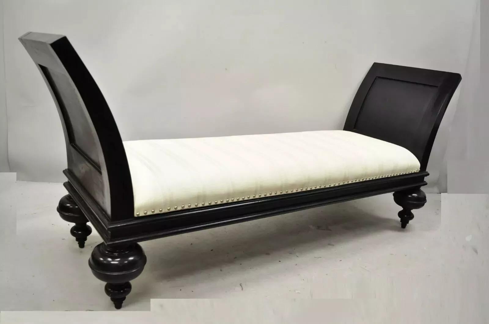 Late 20th C. Hollywood Regency Italian Style Large Black Bun Feet Window Bench. Item features a burlap upholstered seat with green stripes, turn carved bun form feet, flared arms, black distressed finish, very nice item, great style and form. Circa