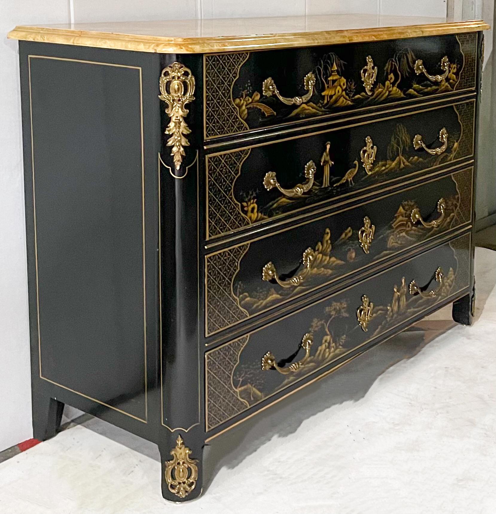 This is an exceptional piece by Baker Furniture. It is the Collector’s Edition chinoiserie commode with gilt bronze appointments. It has French Louis XIV styling. Each drawer front has a unique pastoral scene. The top is a faux marble finish. It is