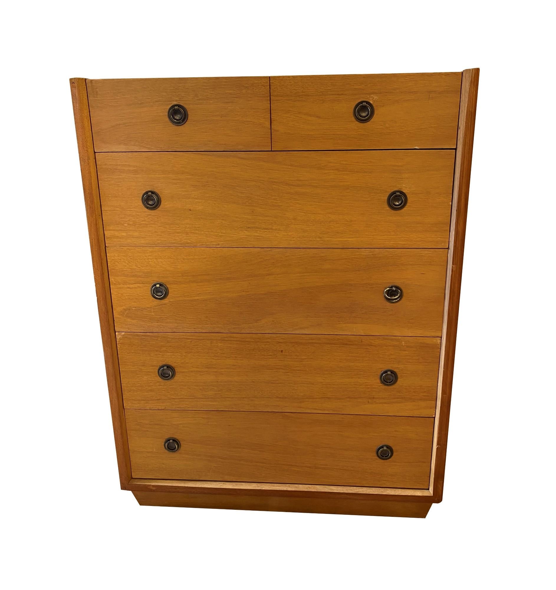 Mid-Century Modern 5 drawer wood dresser with a blond finish. Manufactured by American of Martinsville. Some veneer damage, one pull has a slightly different bale. This can be seen at our 333 West 52nd St location in the Theater District West of