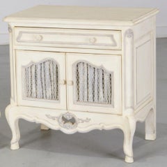 20th c. Pair of Louis XV Style Painted Nightstands with Fabric Door Lining