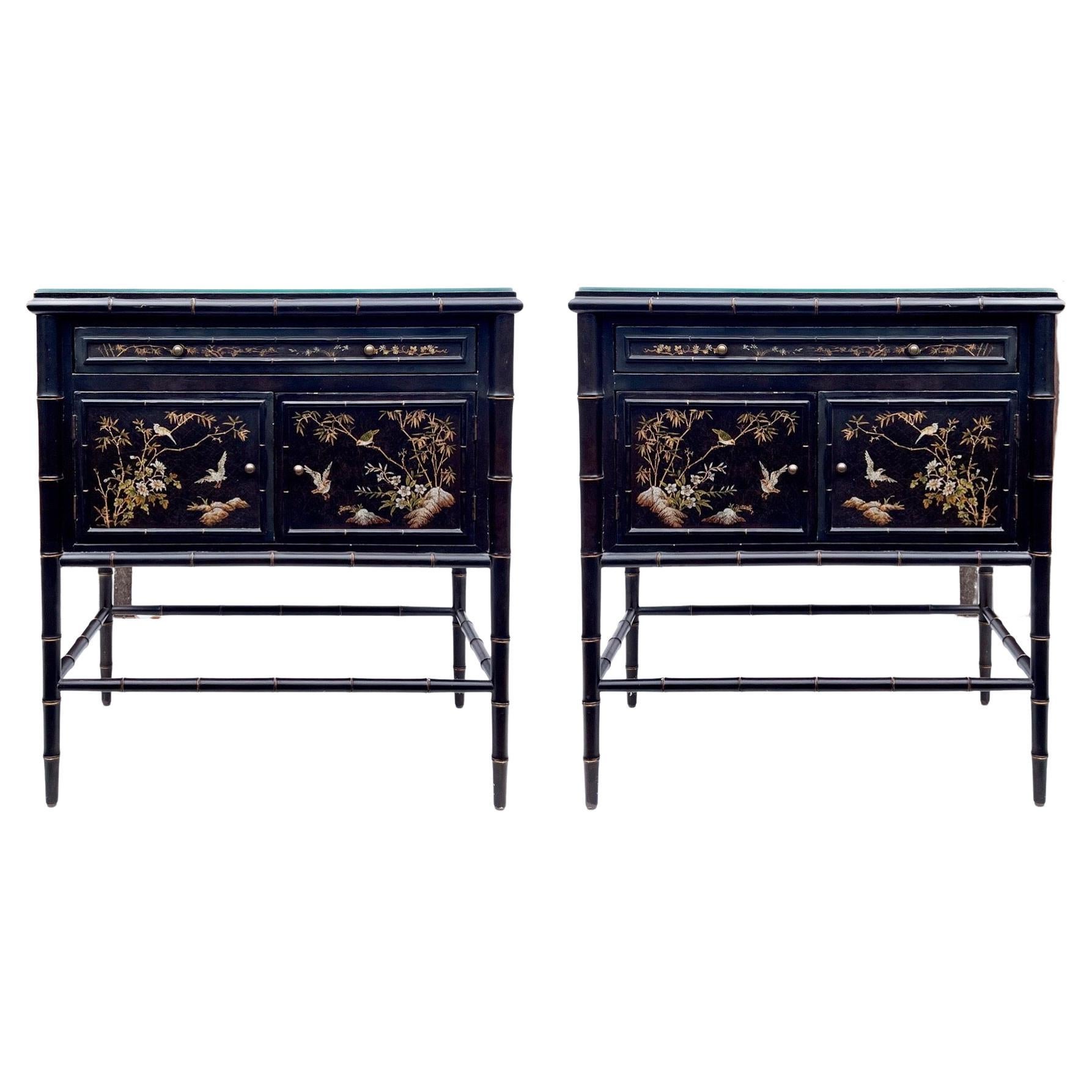 These are wonderful! This is a par of black lacquer regency style faux bamboo and chinoiserie cabinets by Hickory Chair. They are very versatile and could work from dining to bath to bedside to foyer! They are marked and in very good condition.