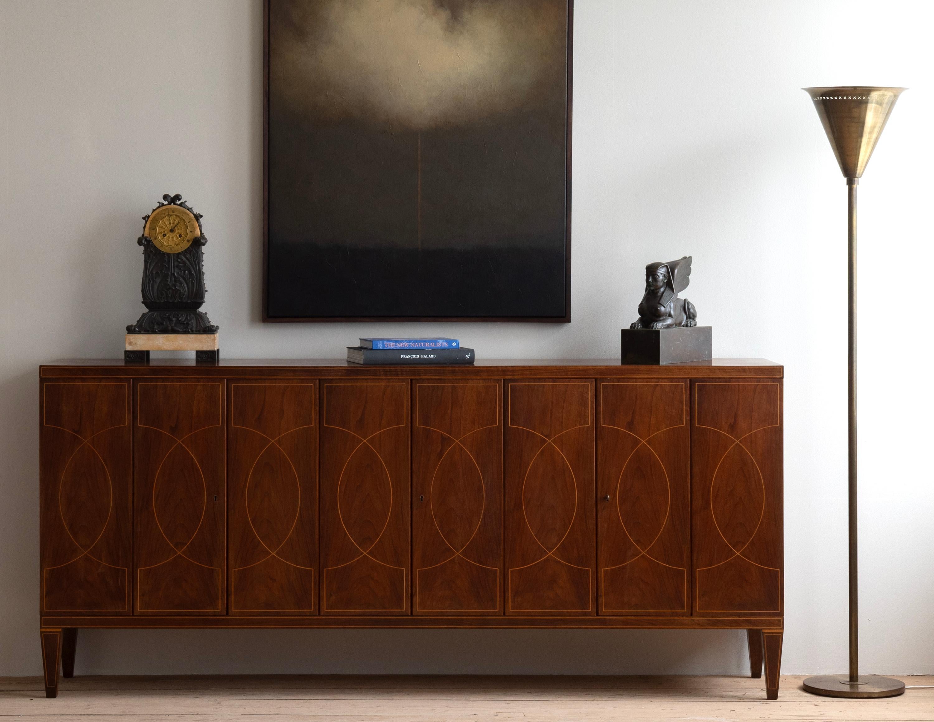 Sideboard in walnut and ash by Paolo Buffa (1903 - 1970) and executed by Mose Turri, Bovisio Mombello, in 1944. Italy. 