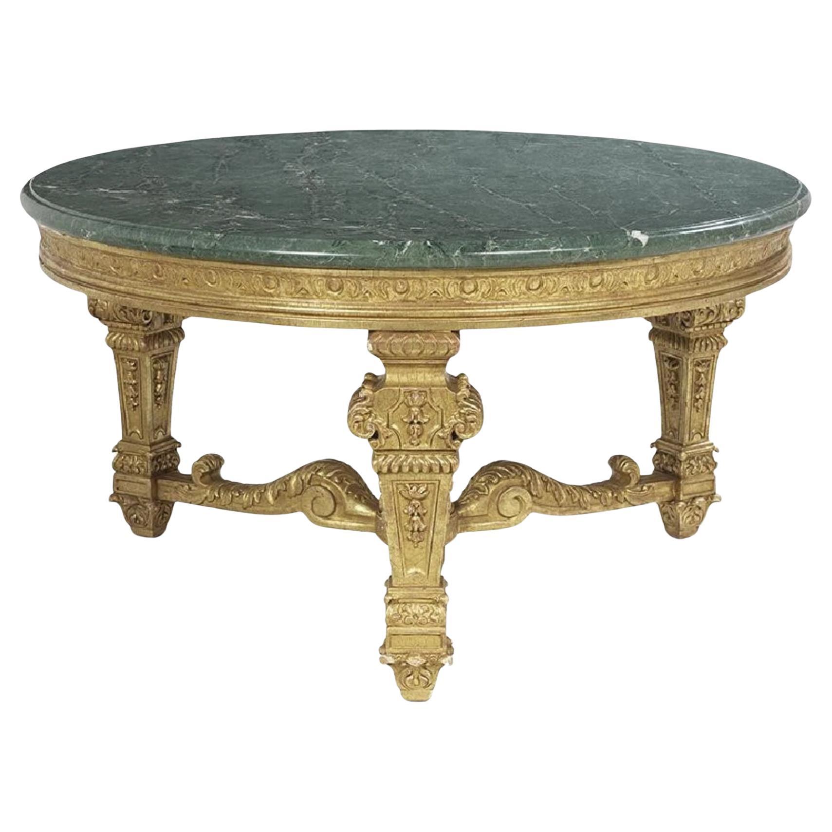 ¡Mesa de centro de madera dorada italiana, circular, con tapa de mármol verde, del s. XX! en venta