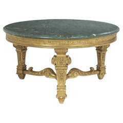 ¡Mesa de centro de madera dorada italiana, circular, con tapa de mármol verde, del s. XX!