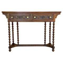 20th Century Carved Two-Drawer Spanish Walnut Console Table with Iron Hardware Antique 20th Century Carved Two-Drawer Spanish Walnut Console Table with Iron Hardware