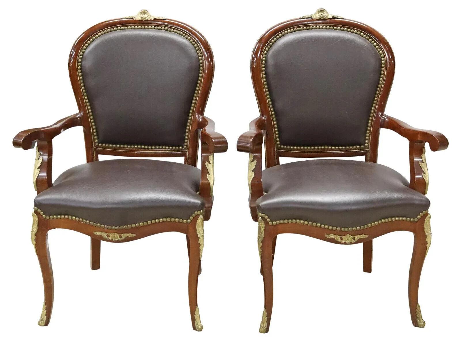 Handsome Fauteuils, (2) Louis XV Style Black, Upholstered, Crest, Nailhead Trim, Vintage, 20th Century!  See other matching desk chair!!

Pair of Louis XV style armchairs, 20th c., frame in a mahogany finish, having shell crest, black upholstery,