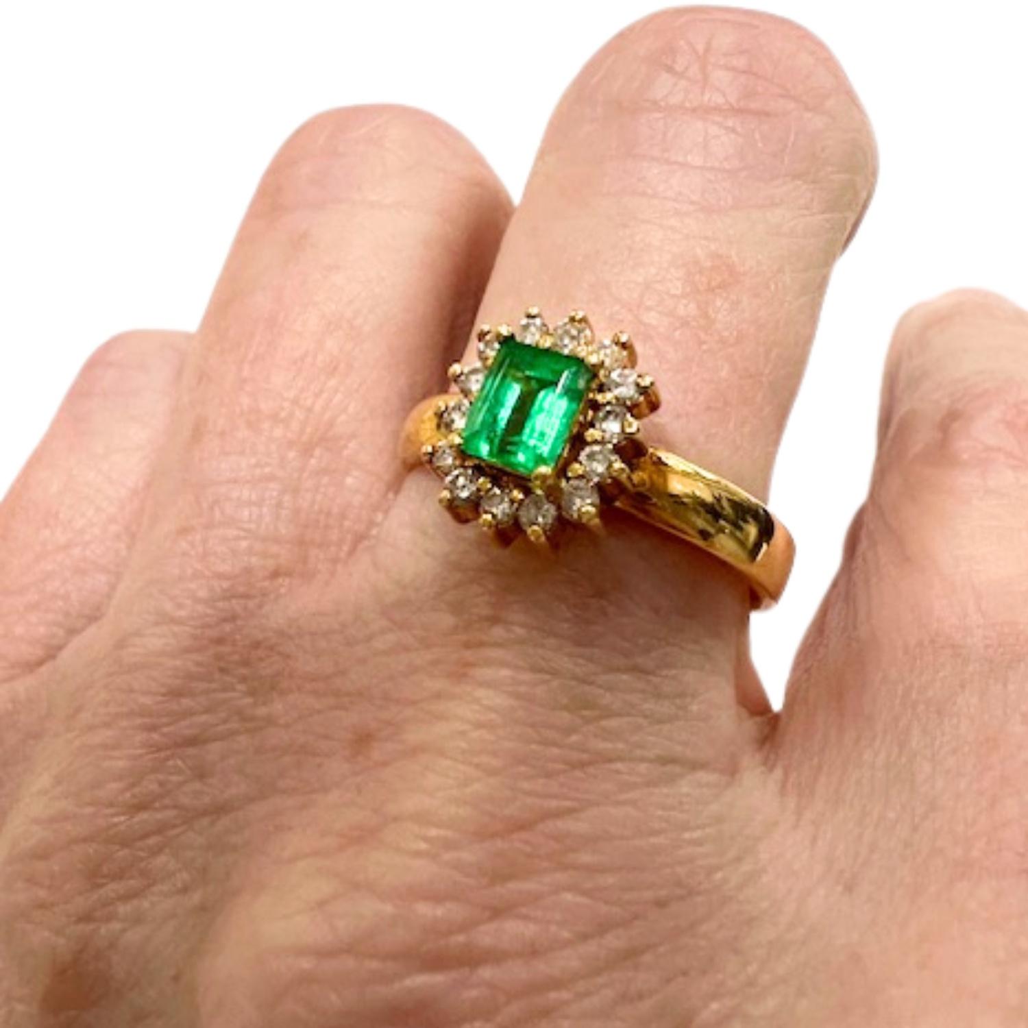 Emerald Cut 20th Century 0.50 carat Emerald  0.26 carat Diamond Cluster Ring For Sale