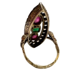 1.05 carats Diamonds, 0.30 carats Rubies, 0.50 carats Emerald Fashion Ring