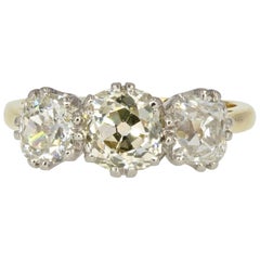 20e siècle - Bague jarretière en or jaune 18 carats avec diamants de 1::50 carat