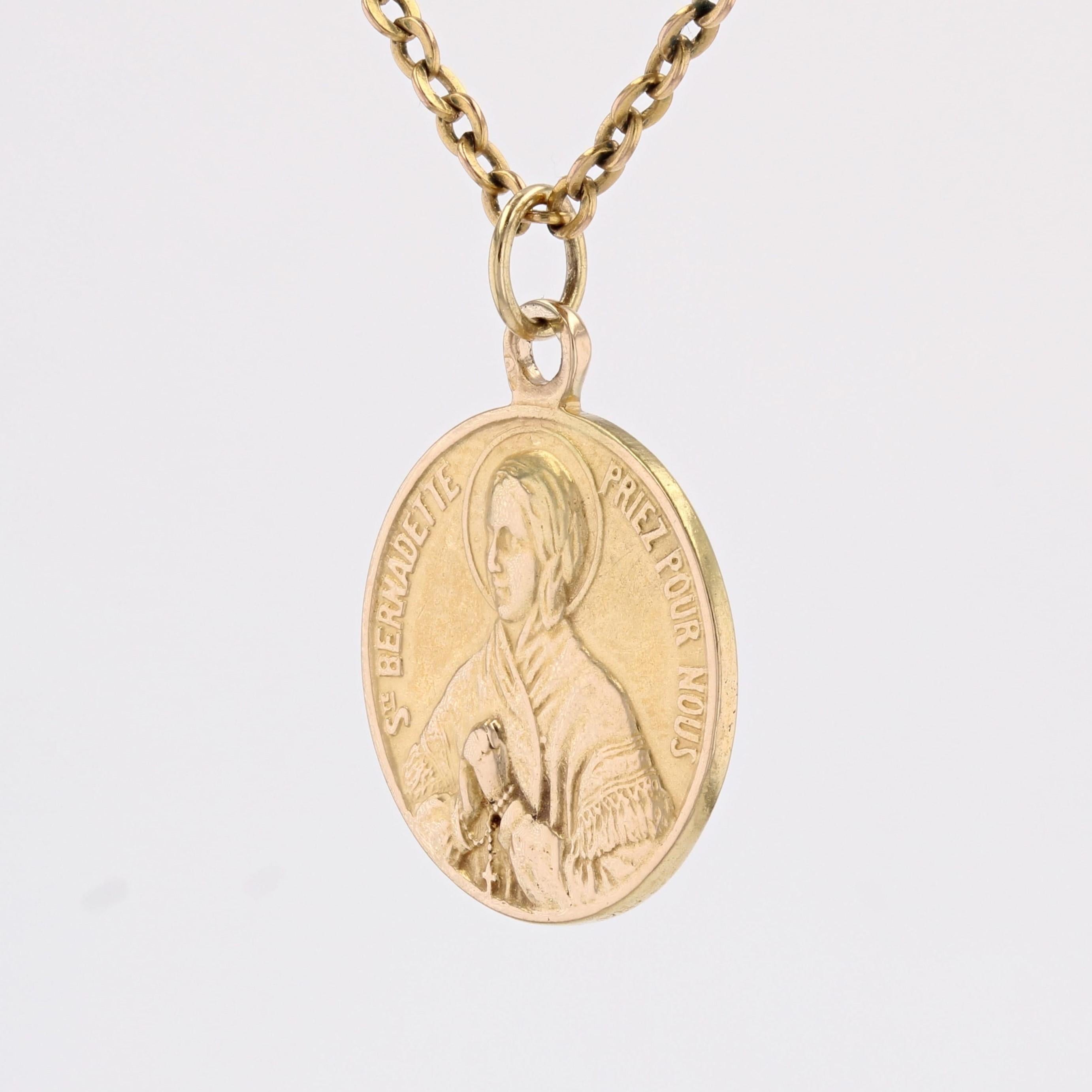 Women's or Men's 20th Century 18 Karat Yellow Gold Saint Bernadette Medal Pendant For Sale