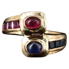 20th Century 18k Gold Sapphire and Ruby Bypass Ring