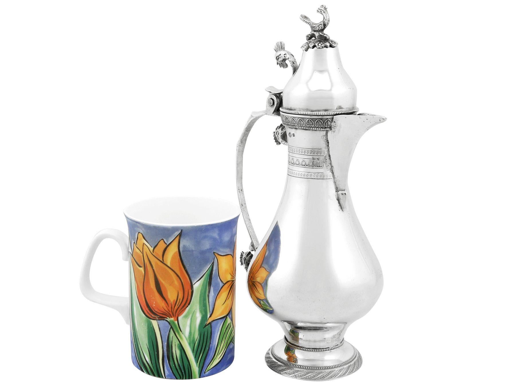 An exceptional, fine and impressive antique Turkish silver coffee jug; an addition to our Asian silver teaware collection.

This exceptional antique Turkish silver coffee jug has a baluster shaped form to a circular spreading foot.

The surface