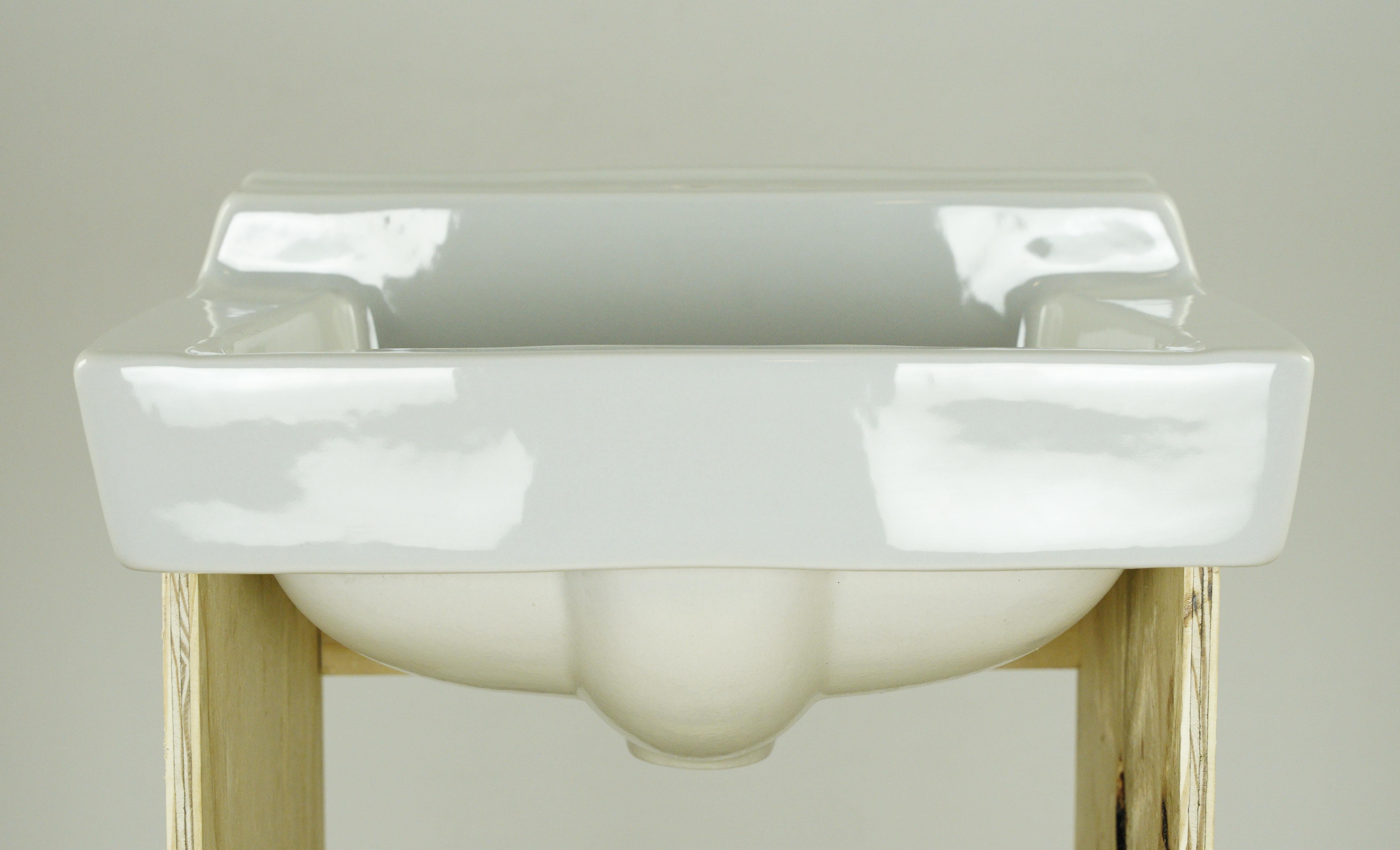 20th Century 19.25 in. White Ceramic Wall Sink In Good Condition For Sale In New York, NY