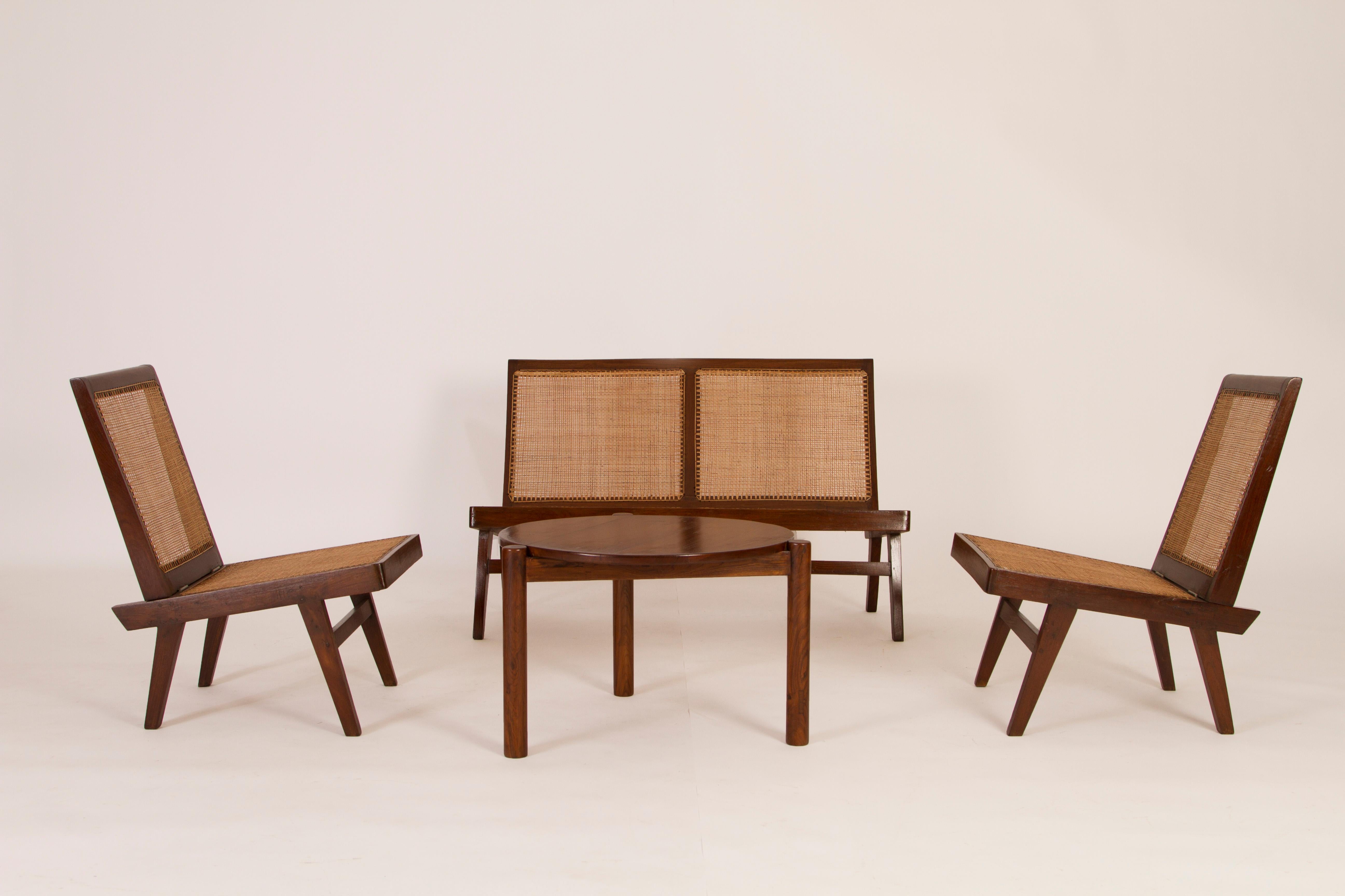 Pierre Jeanneret three-piece folding cane sofa and chairs, teak and cane
Provenance: Private Residences, Chandigarth. India.