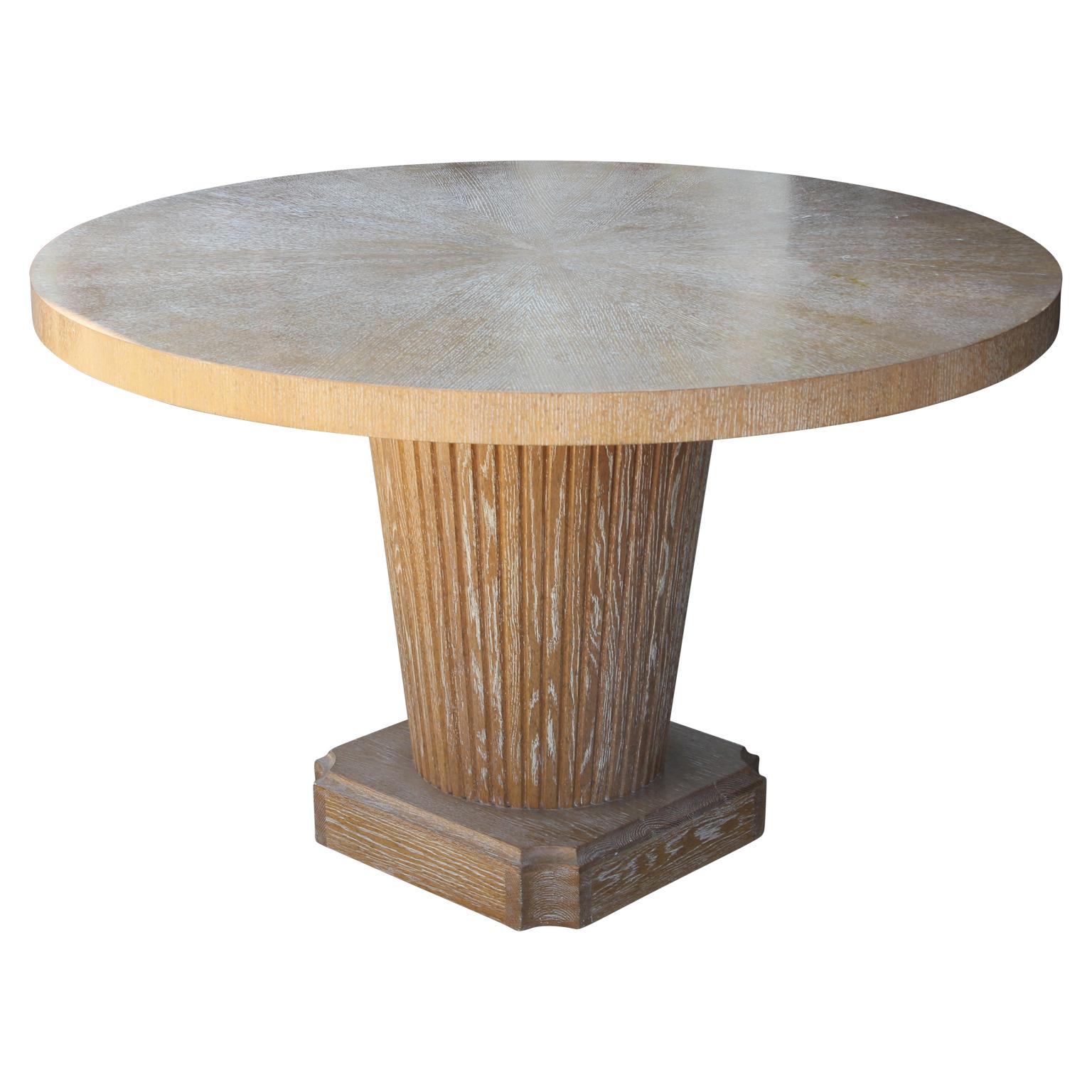 Beautiful 48 inch round dining table. This oak table by Nancy Corzine has a cerused finish and is in the art deco style.
