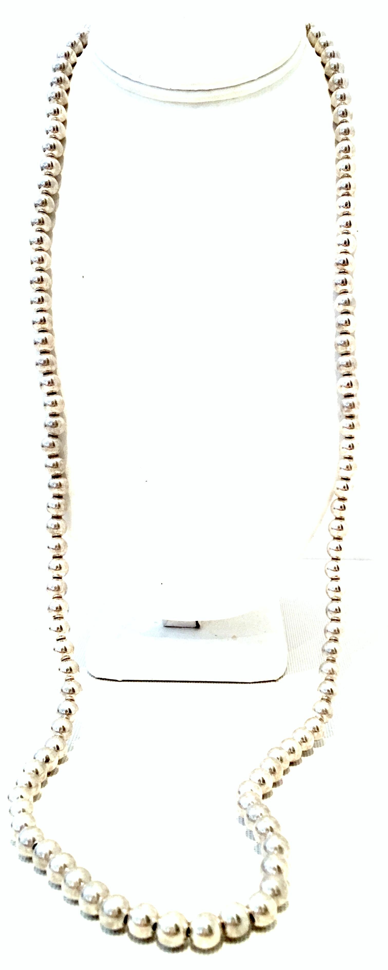 20th Century Classic & Modern 925 Sterling silver bead opera length necklace. Each bead is approximately .25