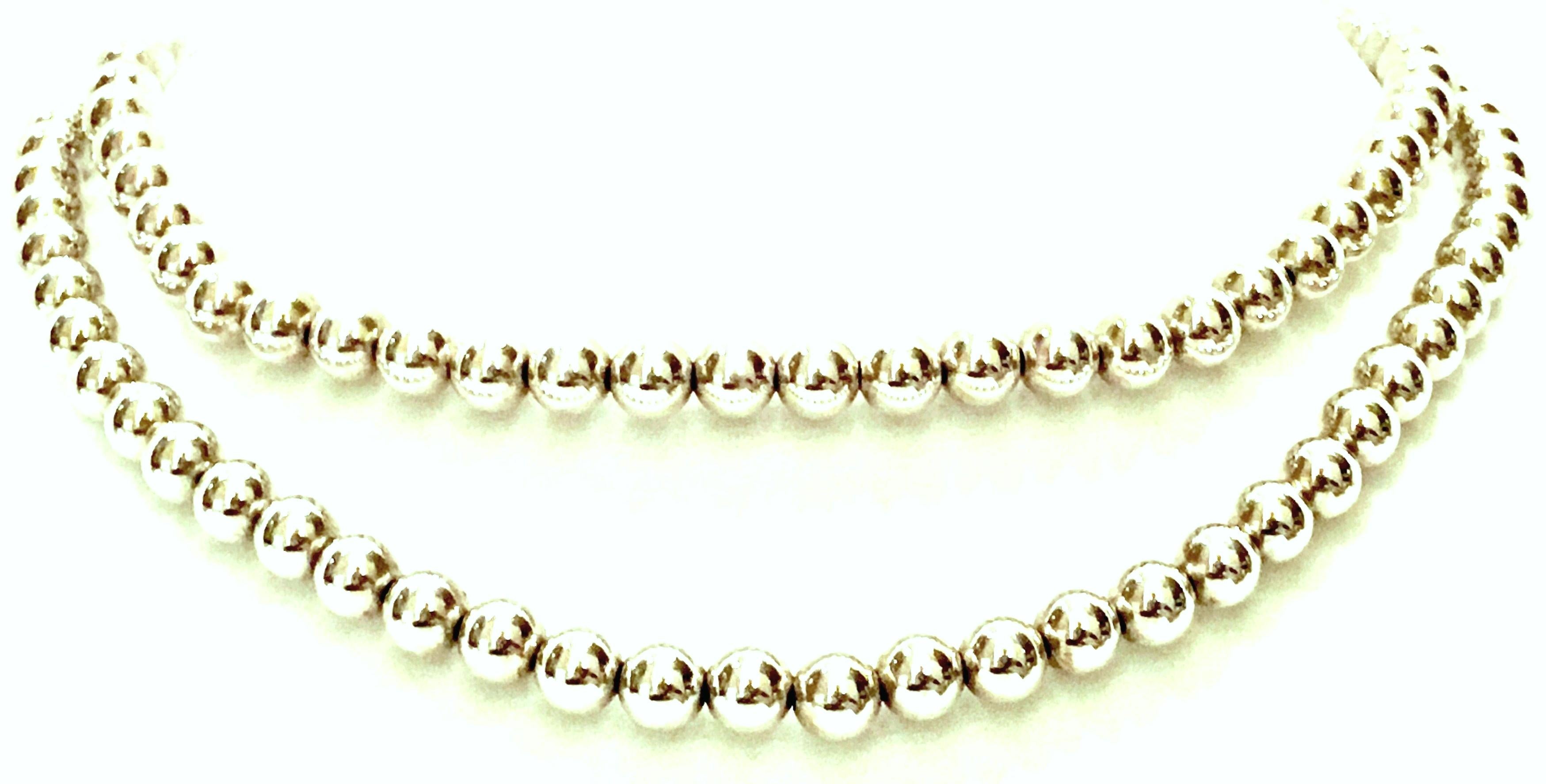 20th Century Classic & Modern Sterling 925 silver bead opera length necklace. Each bead is approximately .25