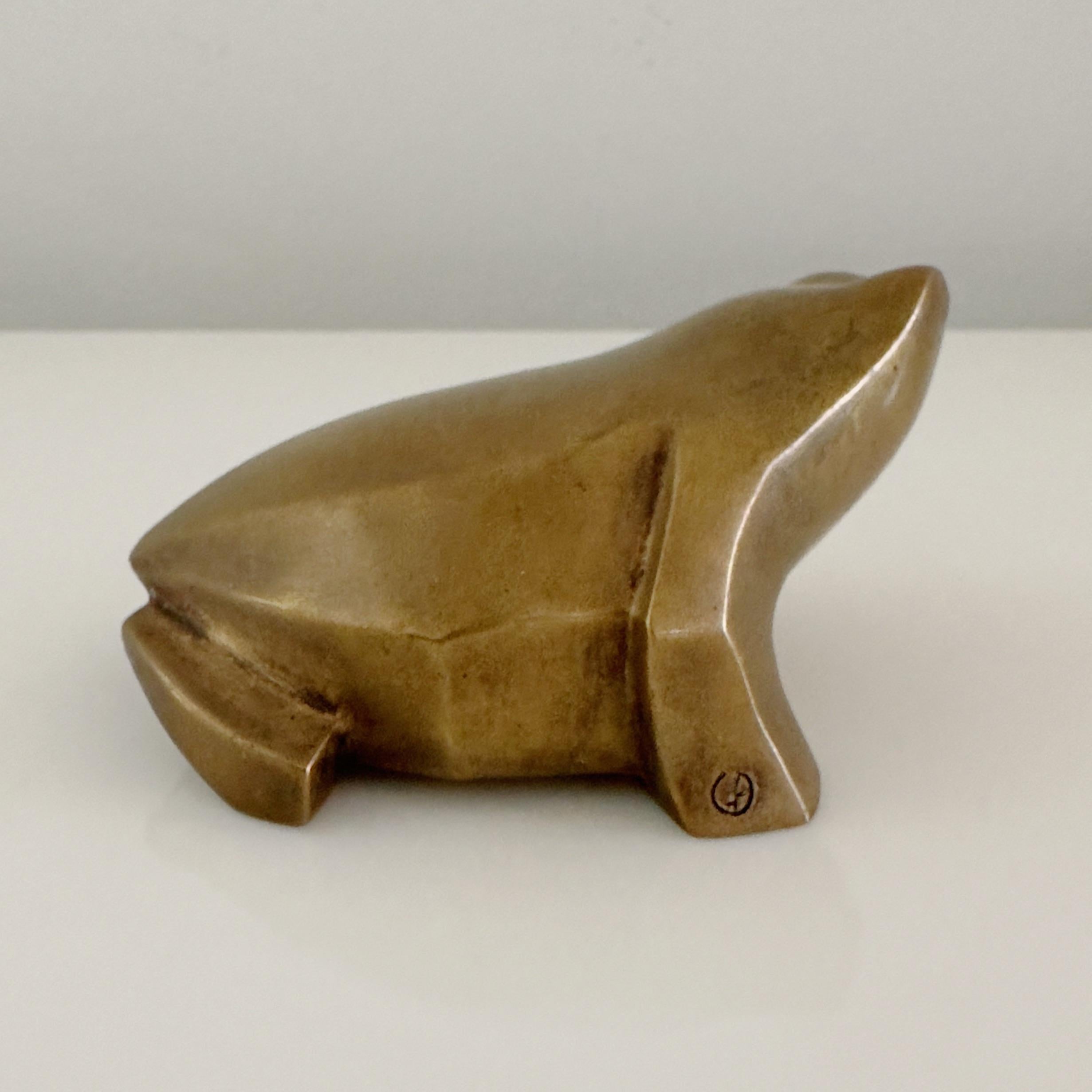 This bronze sculpture of a stylized frog is typical of Boudon's works. He expresses himself with a strong, vibrant form, isolating the animal's characteristic features -- the eyes, feet, and mouth -- to express its spirit. The sculpture is signed