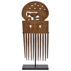 20th Century African Hand Carved Wood Hair Comb of a Hand Holding Bird