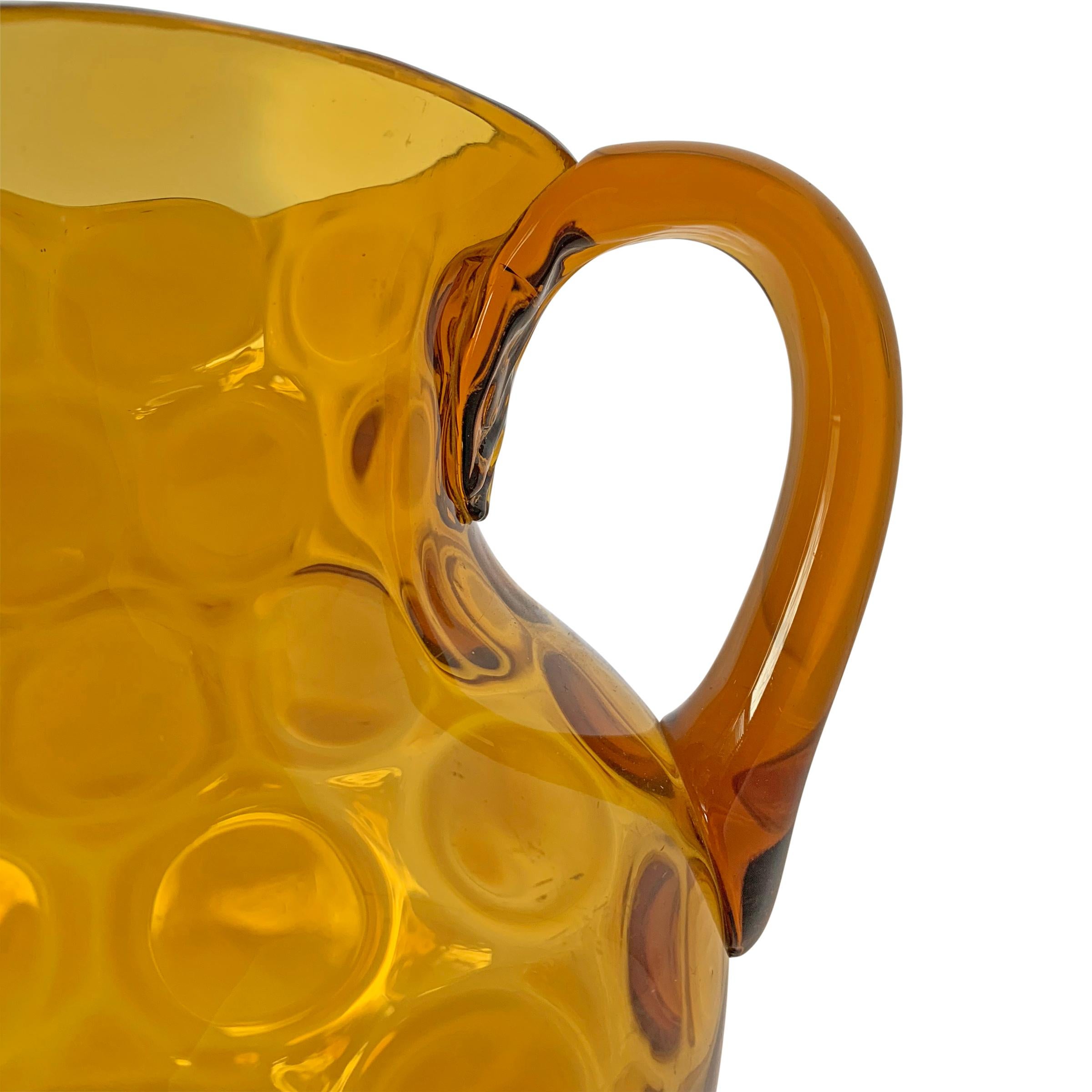 20th Century American Dimpled Amber Glass Pitcher 1