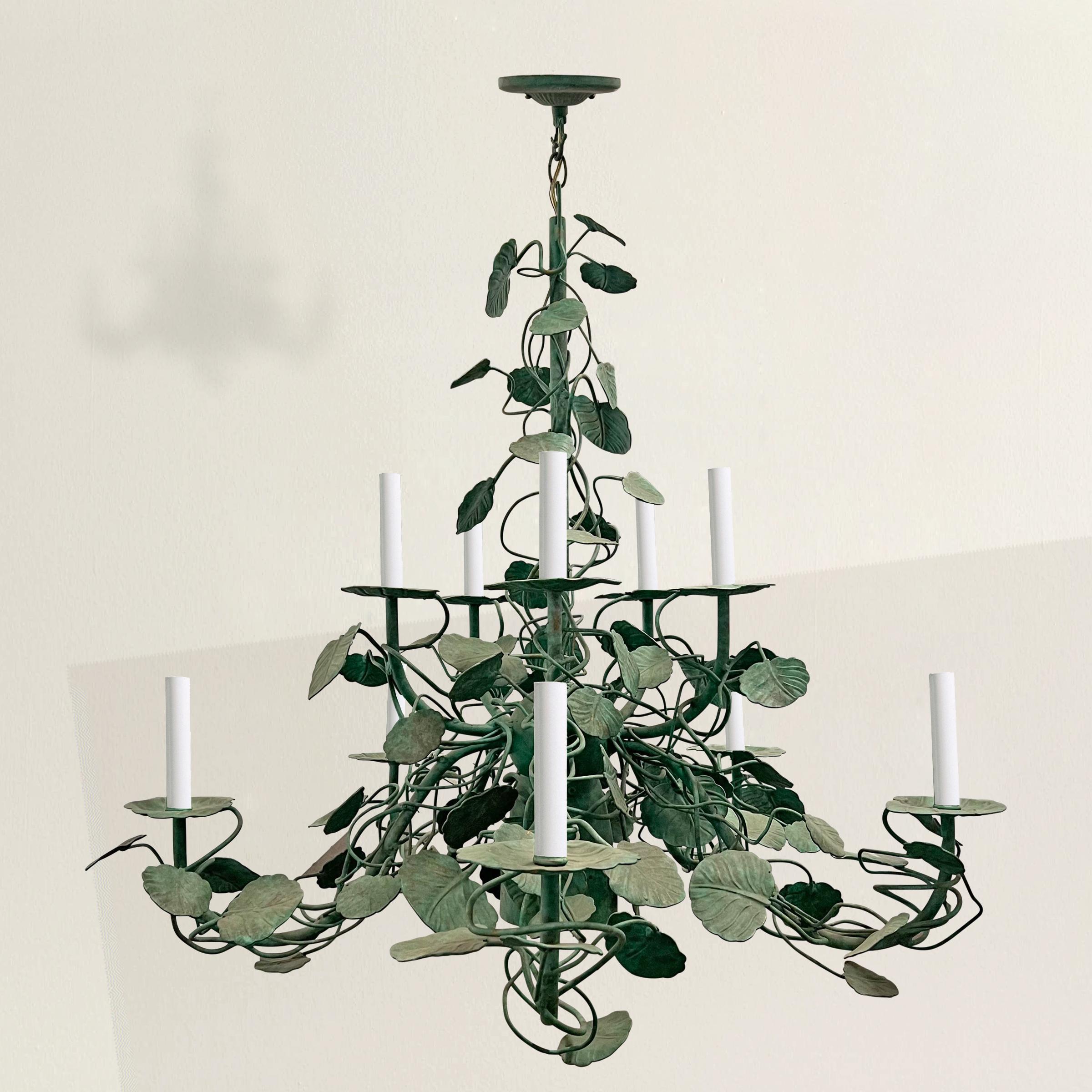Behold the exquisite craftsmanship of this American ten-arm garden vine chandelier, a true masterpiece that seamlessly marries artistry and functionality. Each arm is adorned with hand-wrought scrolling vines and delicately detailed leaves, creating