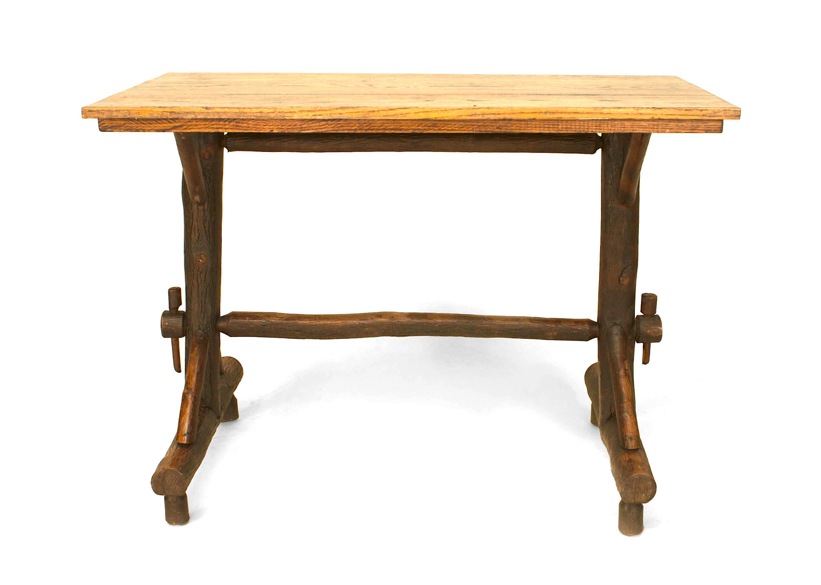 American rustic old Hickory Davenport form rectangular table with a three oak plank top and a double pedestal base connected with two stretchers. Old Hickory paper label under top.


Since 1899 Old Hickory Furniture has been handcrafted in Central