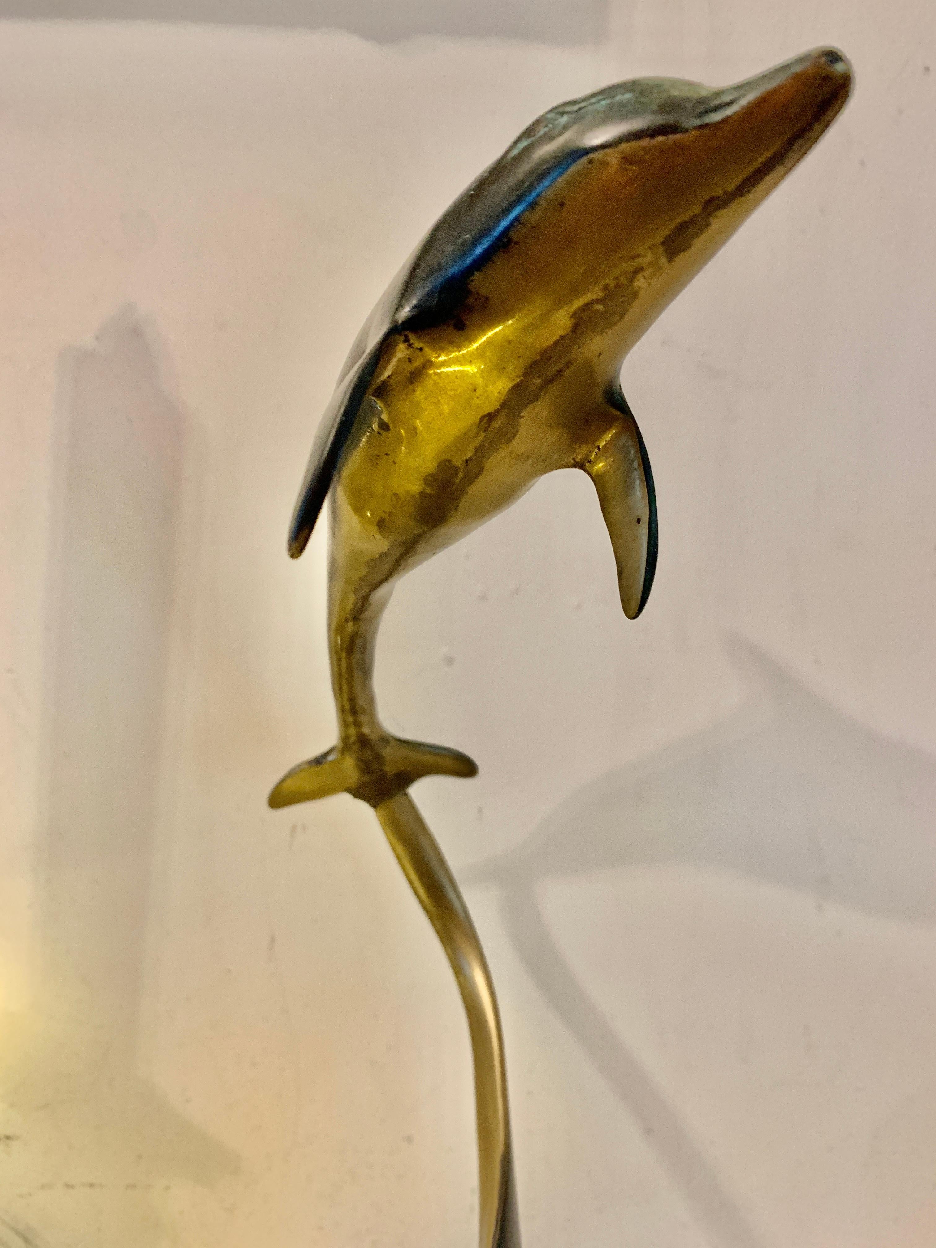 spi dolphin statue