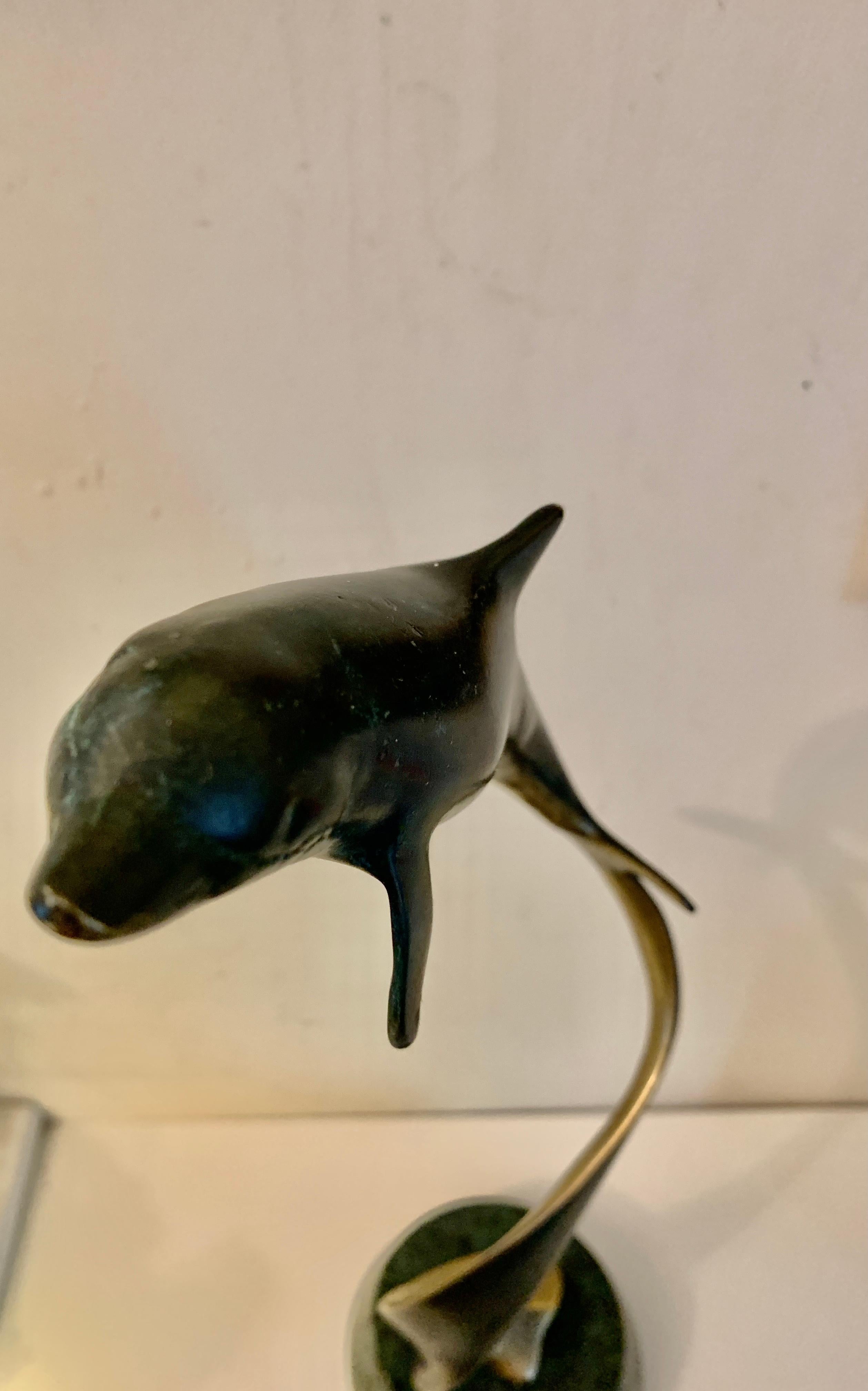 1970s American Modern Bronze Sculpture of a turning, Swimming Dolphin - Gold Figurative Sculpture by 20th century American School