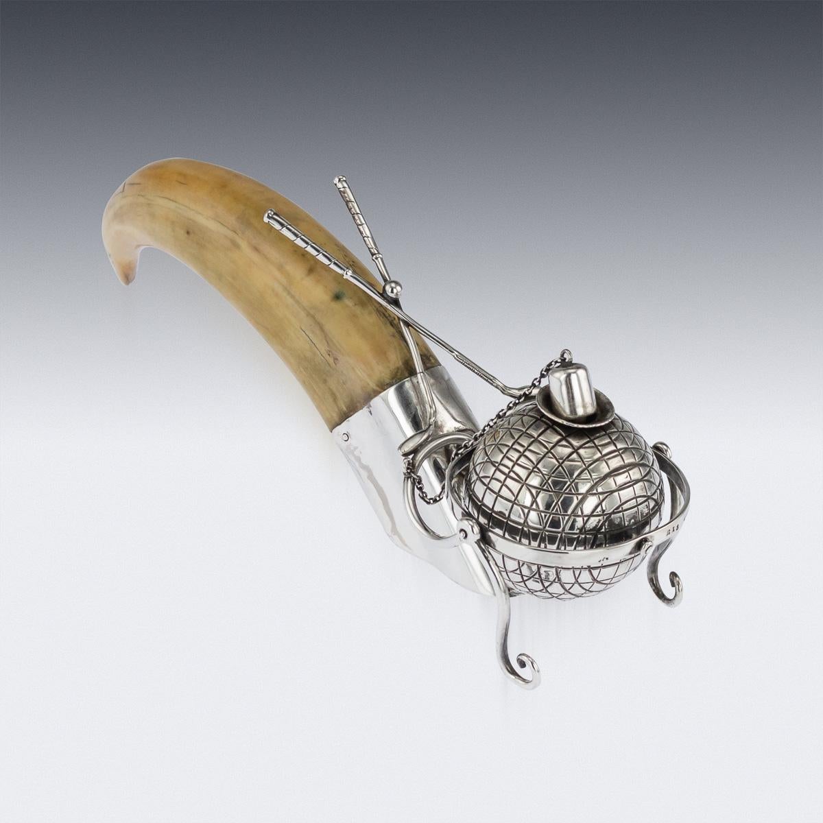 Antique early 20th century American very unusual, novelty solid silver gimbal golf themed lighter, of unusual design, the ball gimbol shaped as a golf ball, mounted with a tusk and adorned by two golf sticks. Hallmarked Sterling (925 silver
