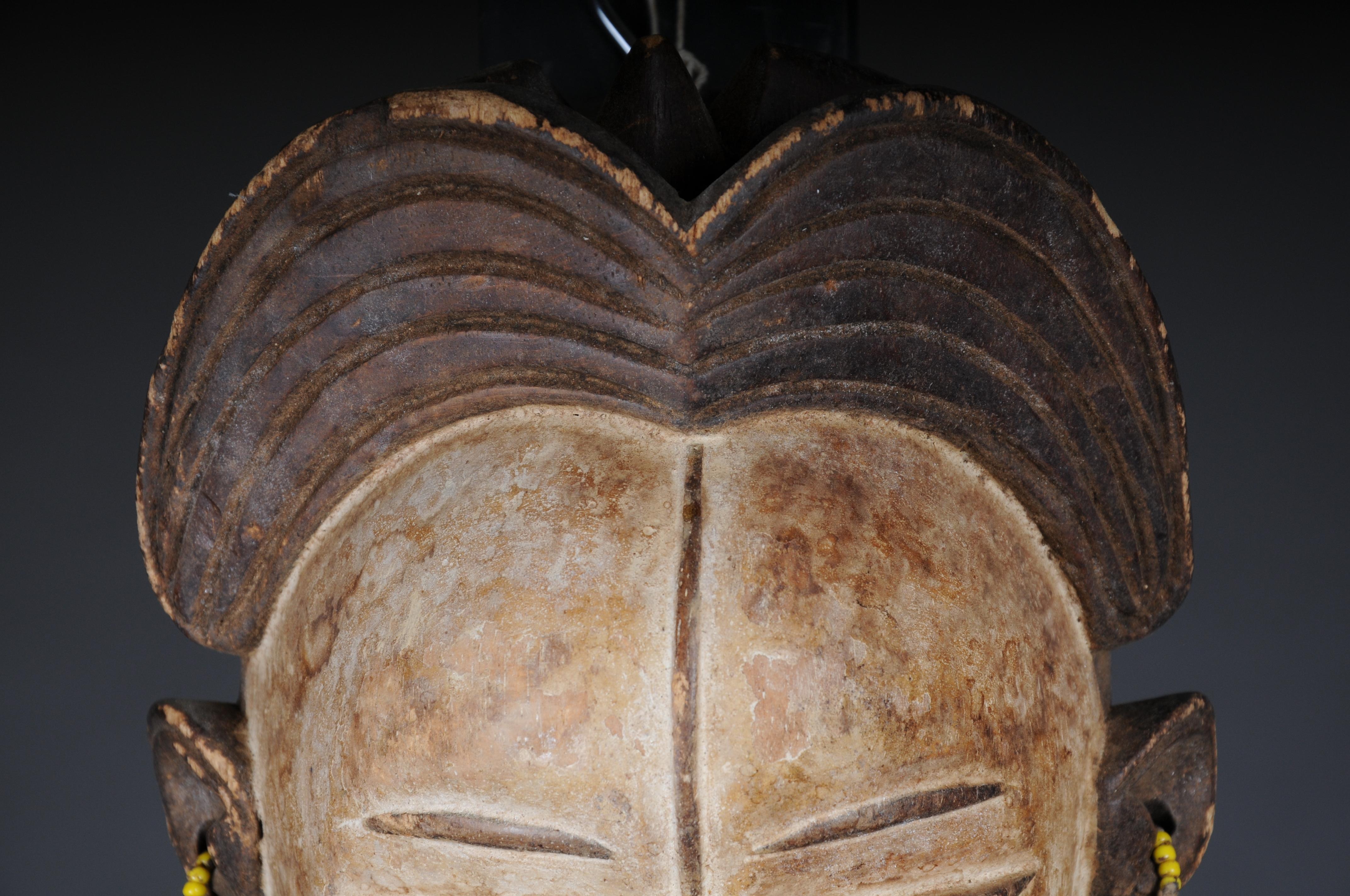 Hand-Carved 20th Century Antique Carved Wooden Face Mask, African Folk Art. Hangable.Decorat For Sale