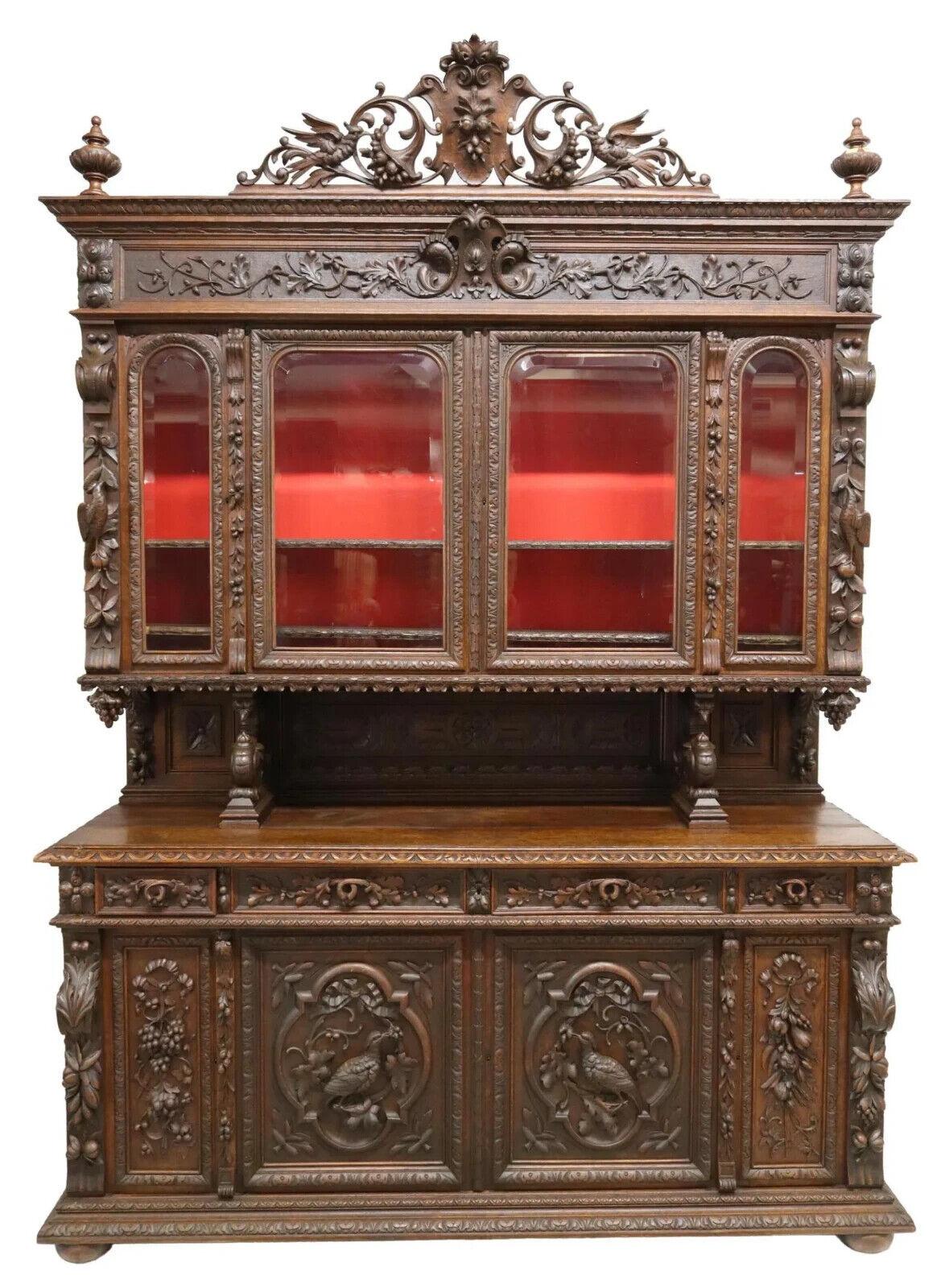 Stunning Antique Sideboard, Hunt, French Henri II Style, Carved, Oak, Beveled Glass , 20th Century, 1900's!

French Henri II style carved oak hunt sideboard, early 20th C., having pierced cartouche and cornucopia crest, four beveled glass doors,