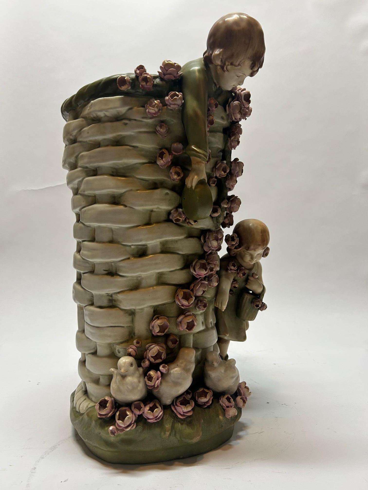 A stunning Italian floor vase with flowers and children.
Very good quality and condition.



